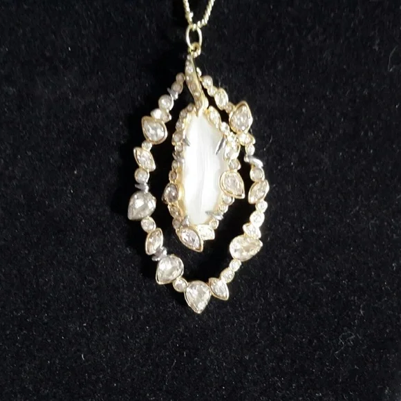 Alexis Bittar Frosted White Lucite with Crystals Necklace in gold setting.